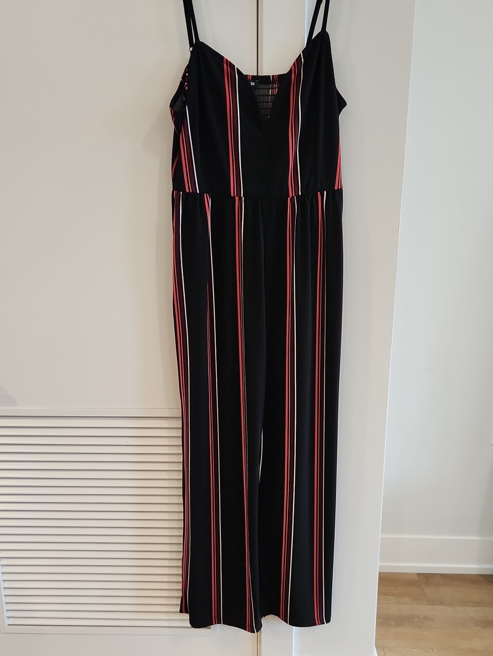Express Black Jumpsuit with Red and White Vertical Stripes